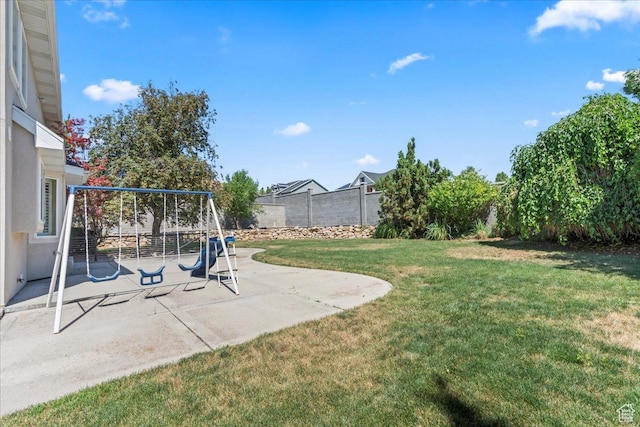 1116 W Wasatch Downs Dr, South Jordan, UT 84095 - fenced backyard with a playground and a patio area