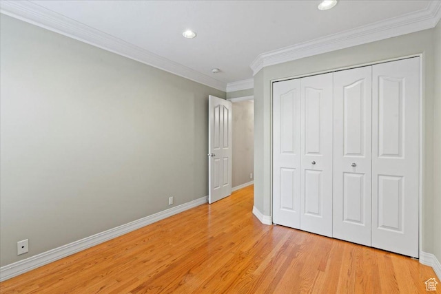 1116 W Wasatch Downs Dr, South Jordan, UT 84095 - unfurnished bedroom with light wood finished floors, ornamental molding, a closet, and recessed lighting