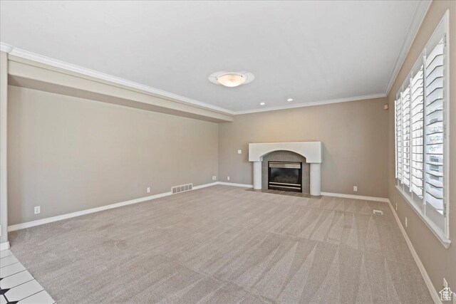 1116 W Wasatch Downs Dr, South Jordan, UT 84095 - unfurnished living room featuring ornamental molding, a fireplace with flush hearth, and carpet flooring
