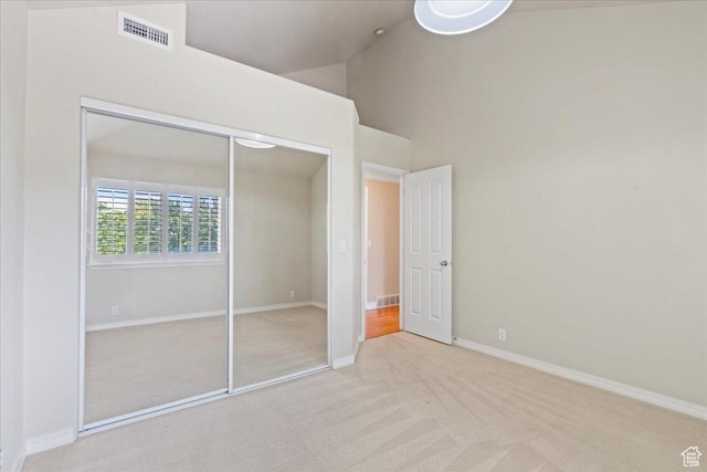 1116 W Wasatch Downs Dr, South Jordan, UT 84095 - unfurnished bedroom featuring carpet flooring, a closet, and vaulted ceiling