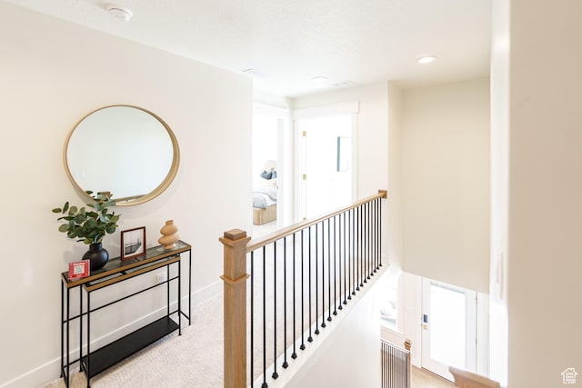 11448 S Watercourse Rd, South Jordan, UT 84009 - hallway with an upstairs landing, light colored carpet, and recessed lighting