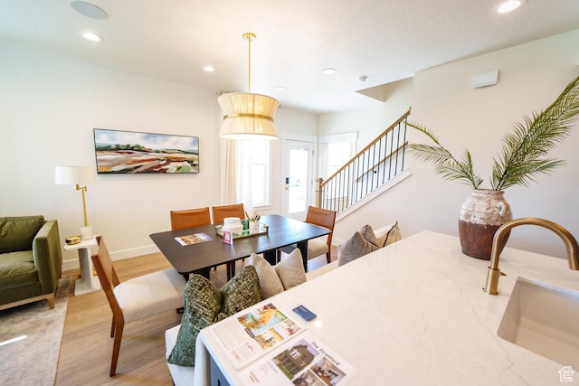 11448 S Watercourse Rd, South Jordan, UT 84009 - dining room with stairs, light wood finished floors, and recessed lighting