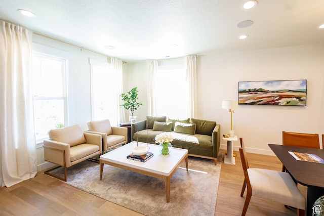 11448 S Watercourse Rd, South Jordan, UT 84009 - living room featuring light wood-style floors and recessed lighting