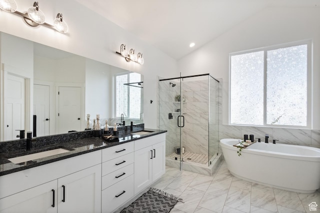 3973 N 900 W, Lehi, UT 84043 - full bathroom featuring lofted ceiling, double vanity, a soaking tub, a stall shower, and marble finish flooring
