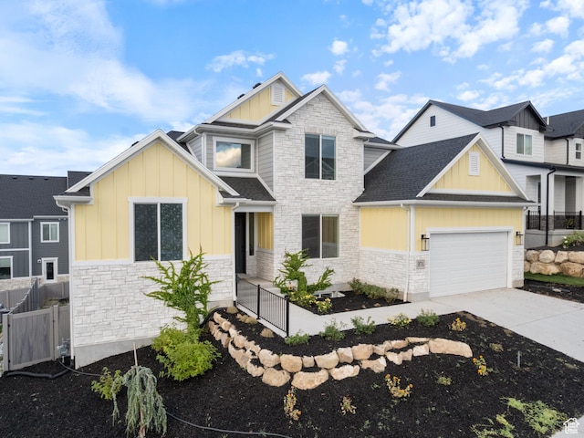 3973 N 900 W, Lehi, UT 84043 - craftsman house with board and batten siding, stone siding, driveway, a garage, and roof with shingles
