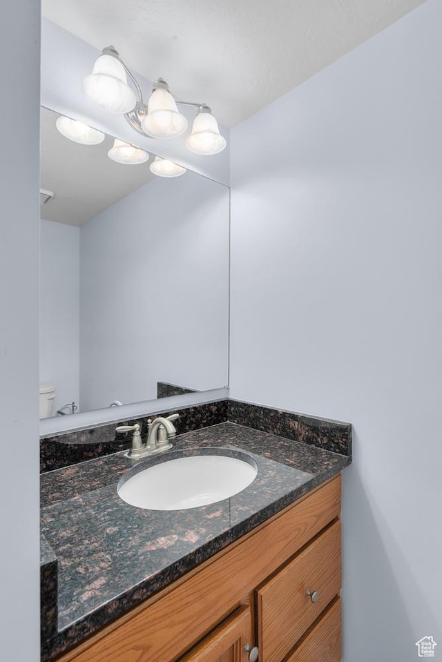 3548 E Wasatch Hills Ln S, Cottonwood Heights, UT 84121 - bathroom with vanity and toilet