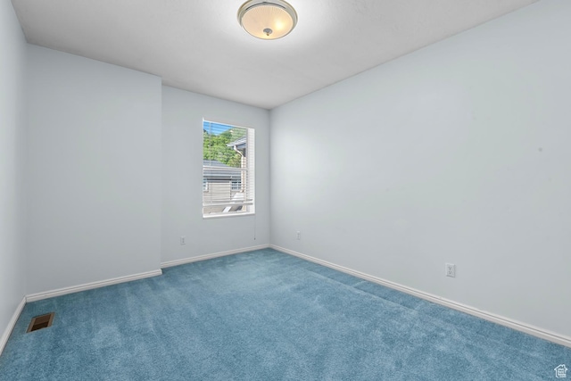 3548 E Wasatch Hills Ln S, Cottonwood Heights, UT 84121 - carpeted spare room featuring baseboards