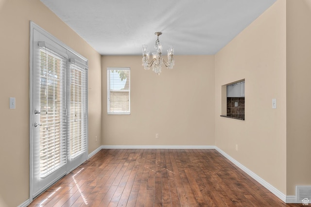 3548 E Wasatch Hills Ln S, Cottonwood Heights, UT 84121 - unfurnished dining area with a chandelier and hardwood / wood-style flooring
