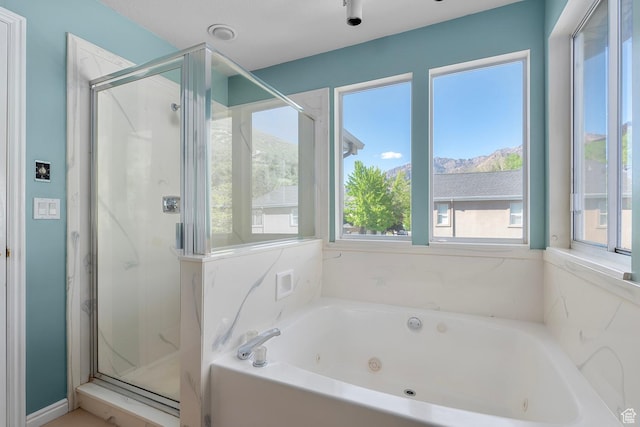 3548 E Wasatch Hills Ln S, Cottonwood Heights, UT 84121 - bathroom with a whirlpool tub, a shower stall, and a mountain view