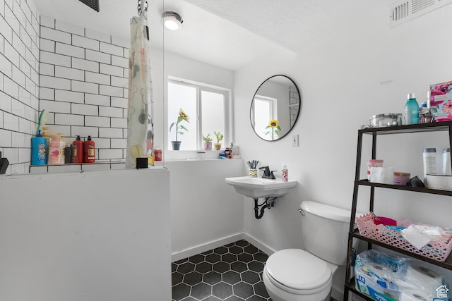 4323 W Benview Dr, West Valley City, UT 84120 - full bathroom with a shower with shower curtain and tile patterned floors