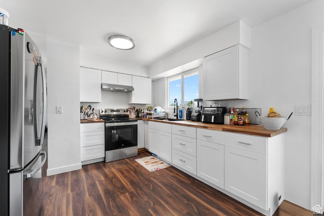 4323 W Benview Dr, West Valley City, UT 84120 - kitchen featuring stainless steel appliances, wooden counters, under cabinet range hood, and white cabinetry