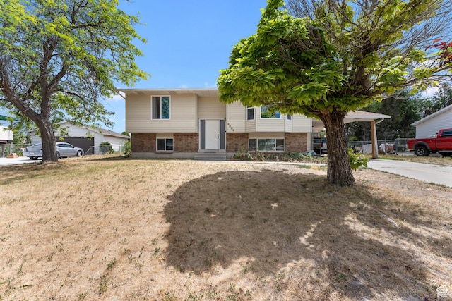 4323 W Benview Dr, West Valley City, UT 84120 - raised ranch featuring brick siding