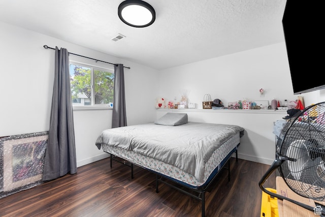 4323 W Benview Dr, West Valley City, UT 84120 - bedroom with wood finished floors and a textured ceiling