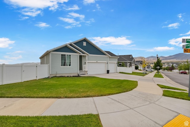7603 S Scenic Maple Dr S, West Jordan, UT 84081 - single story home featuring driveway, an attached garage, and a mountain view