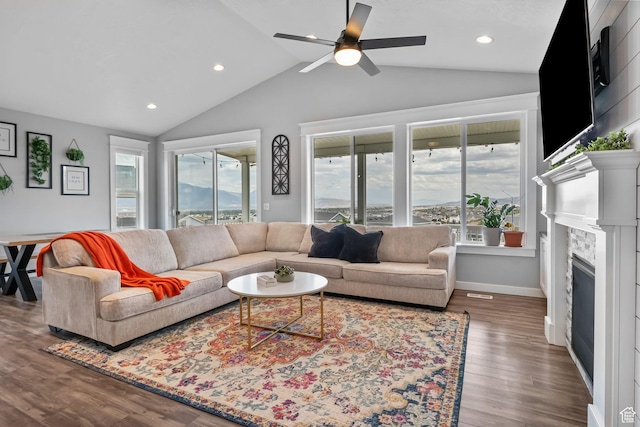 7603 S Scenic Maple Dr S, West Jordan, UT 84081 - living area with lofted ceiling, a ceiling fan, wood finished floors, a fireplace, and recessed lighting