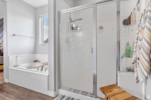 7603 S Scenic Maple Dr S, West Jordan, UT 84081 - full bathroom with a shower stall, a bath, and wood finished floors