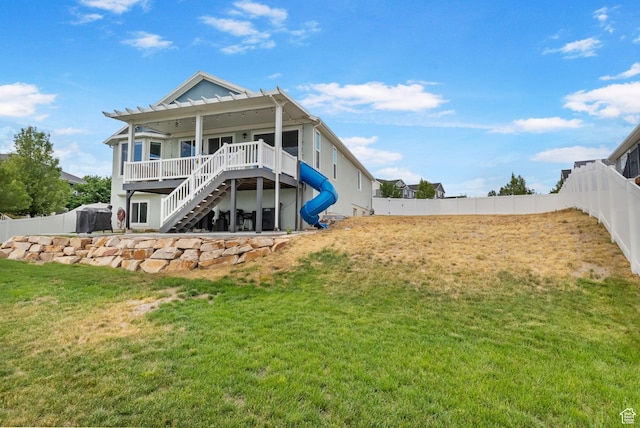7603 S Scenic Maple Dr S, West Jordan, UT 84081 - back of house with stairway, a fenced backyard, and a wooden deck