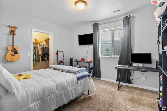7603 S Scenic Maple Dr S, West Jordan, UT 84081 - bedroom with a textured ceiling, carpet flooring, and a walk in closet
