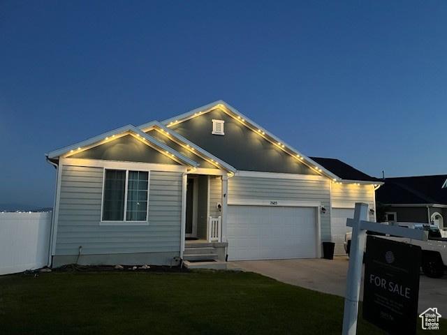 7603 S Scenic Maple Dr S, West Jordan, UT 84081 - view of front of property with an attached garage and concrete driveway