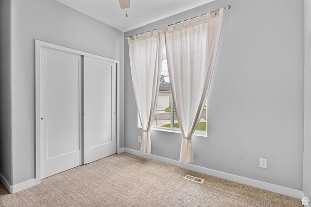 7603 S Scenic Maple Dr S, West Jordan, UT 84081 - unfurnished bedroom with carpet flooring, a closet, and ceiling fan