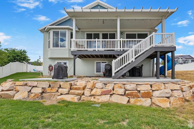 7603 S Scenic Maple Dr S, West Jordan, UT 84081 - back of property with a deck, a patio area, stucco siding, and stairway