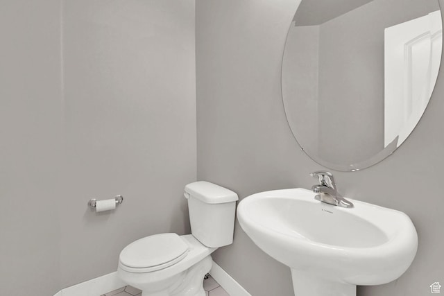 9602 N Blue Sky Dr, Eagle Mountain, UT 84005 - half bath featuring baseboards and tile patterned floors