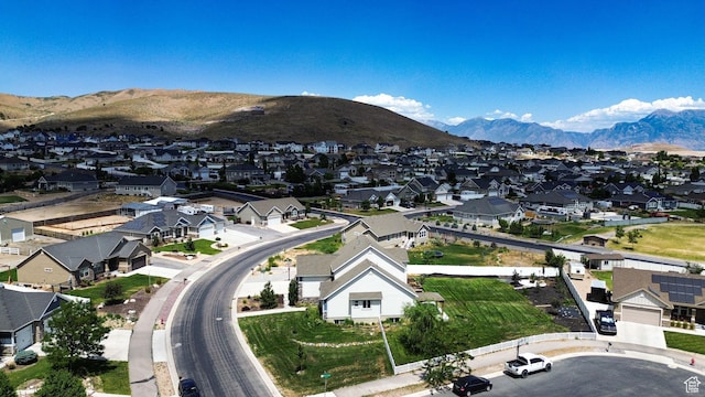 9602 N Blue Sky Dr, Eagle Mountain, UT 84005 - aerial perspective of suburban area with a mountainous background