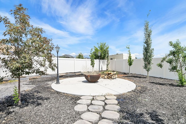 9602 N Blue Sky Dr, Eagle Mountain, UT 84005 - fenced backyard featuring a patio area