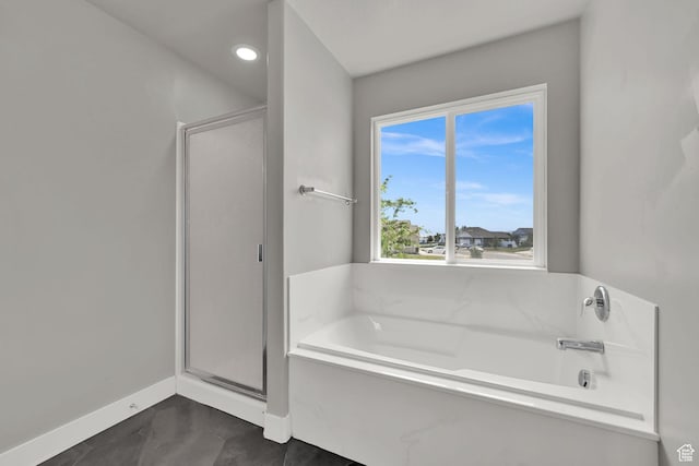 9602 N Blue Sky Dr, Eagle Mountain, UT 84005 - full bath featuring a stall shower, a bath, marble finish floors, and recessed lighting