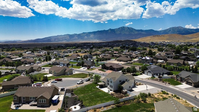 9602 N Blue Sky Dr, Eagle Mountain, UT 84005 - aerial perspective of suburban area with a mountain backdrop