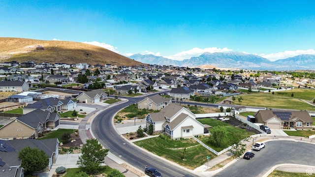 9602 N Blue Sky Dr, Eagle Mountain, UT 84005 - aerial view of property and surrounding area with nearby suburban area and mountains