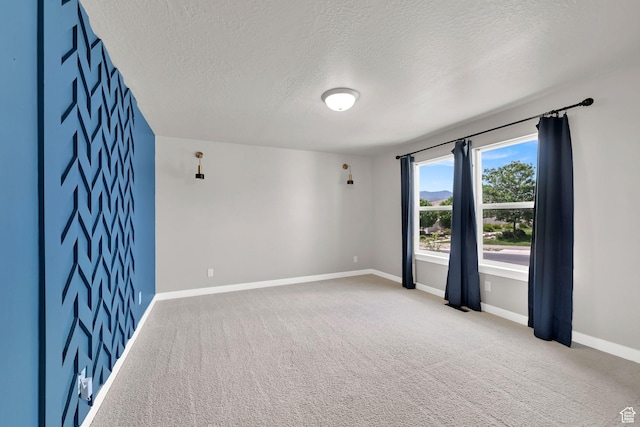 9602 N Blue Sky Dr, Eagle Mountain, UT 84005 - carpeted empty room with a textured ceiling and baseboards
