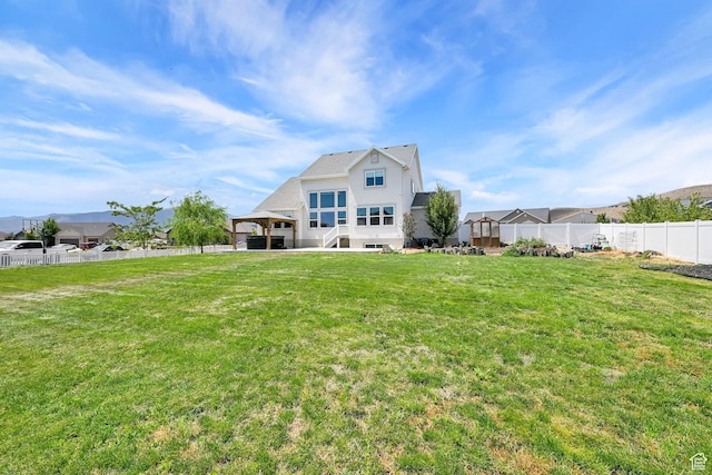 9602 N Blue Sky Dr, Eagle Mountain, UT 84005 - rear view of property featuring stucco siding and a fenced backyard