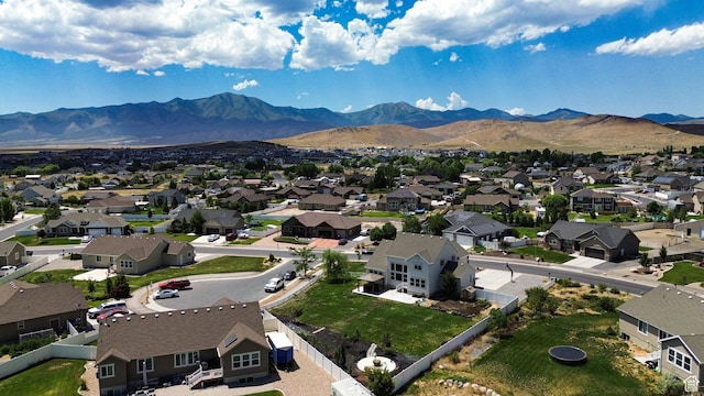 9602 N Blue Sky Dr, Eagle Mountain, UT 84005 - aerial view of residential area with a mountainous background