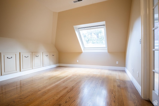 13251 S 1162 E, Draper, UT 84020 - additional living space featuring wood finished floors and lofted ceiling