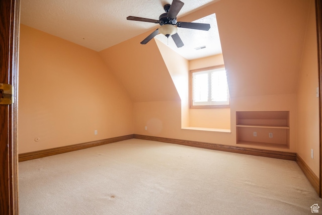 13251 S 1162 E, Draper, UT 84020 - additional living space featuring carpet floors, lofted ceiling, ceiling fan, and a textured ceiling