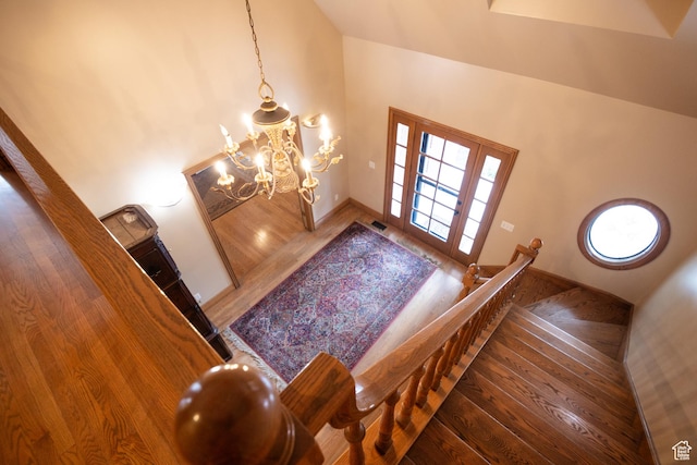 13251 S 1162 E, Draper, UT 84020 - entrance foyer featuring wood finished floors, high vaulted ceiling, and a chandelier