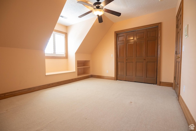13251 S 1162 E, Draper, UT 84020 - additional living space with carpet, lofted ceiling, ceiling fan, built in shelves, and a textured ceiling