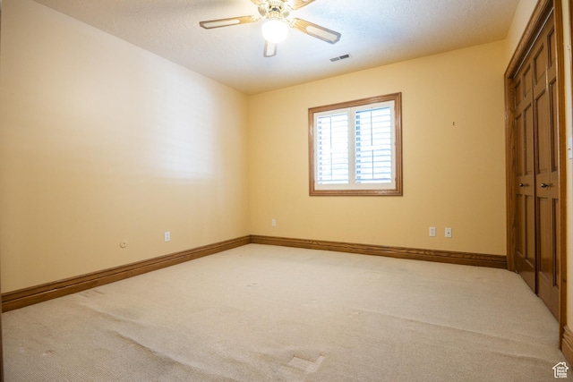 13251 S 1162 E, Draper, UT 84020 - unfurnished bedroom with carpet flooring, a closet, a textured ceiling, and ceiling fan