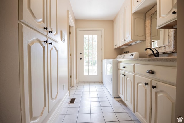 13251 S 1162 E, Draper, UT 84020 - laundry room with cabinet space, washer / clothes dryer, and light tile patterned floors