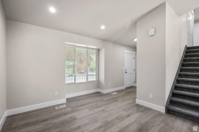 155 N 1600 W, West Point, UT 84015 - empty room featuring stairway, wood finished floors, recessed lighting, and lofted ceiling