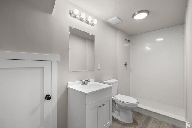 155 N 1600 W, West Point, UT 84015 - bathroom featuring vanity, a shower, and wood finished floors