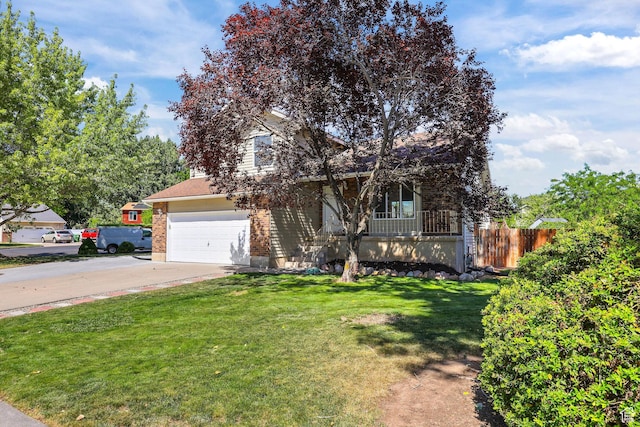 155 N 1600 W, West Point, UT 84015 - view of property hidden behind natural elements with driveway, an attached garage, and brick siding