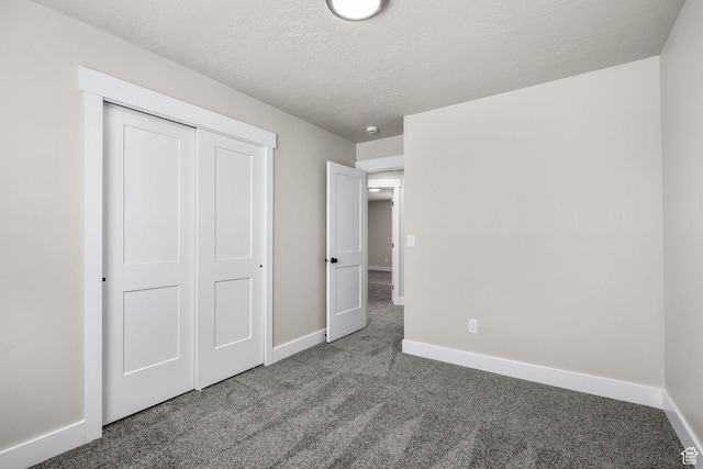 155 N 1600 W, West Point, UT 84015 - unfurnished bedroom with carpet floors, a textured ceiling, and a closet