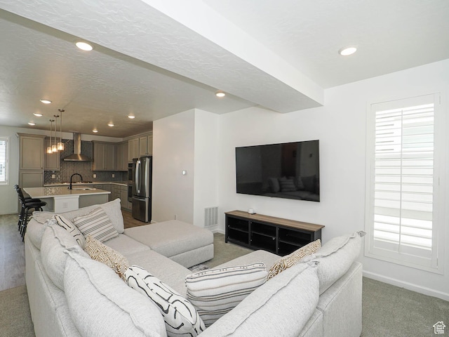 609 E 460 S, American Fork, UT 84003 - living room featuring light carpet and recessed lighting