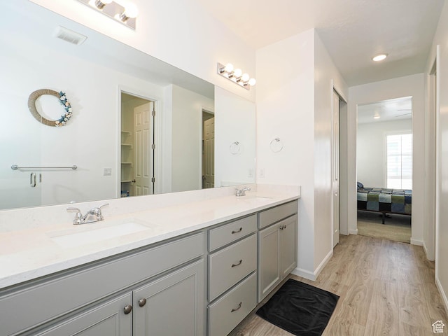 609 E 460 S, American Fork, UT 84003 - ensuite bathroom featuring double vanity and wood finished floors