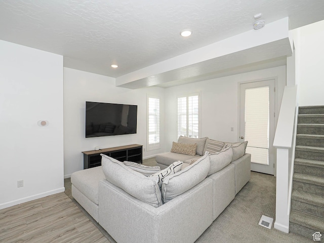 609 E 460 S, American Fork, UT 84003 - living area featuring stairway, light wood-style floors, recessed lighting, and a textured ceiling
