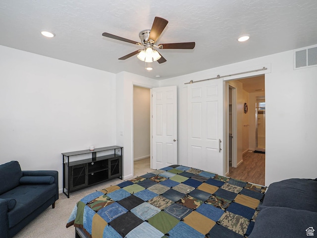 609 E 460 S, American Fork, UT 84003 - bedroom with recessed lighting, ceiling fan, and a barn door