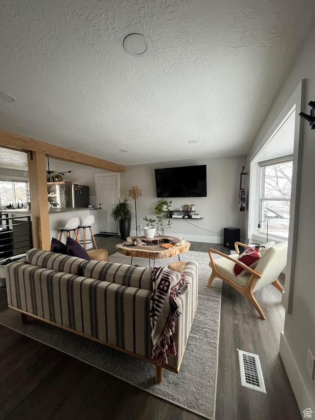 1101 W 1870 N, Lehi, UT 84043 - living room featuring a textured ceiling, wood finished floors, and plenty of natural light