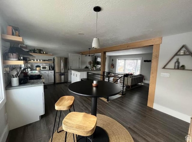 1101 W 1870 N, Lehi, UT 84043 - dining room featuring dark wood finished floors and a textured ceiling